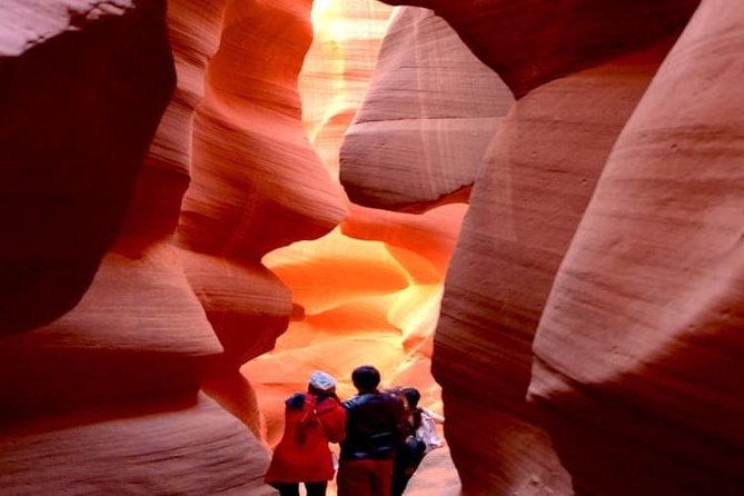 Antelope Canyon and Horseshoe Bend Day Tour from Flagstaff - Entering Antelope Canyon with a Navajo guide