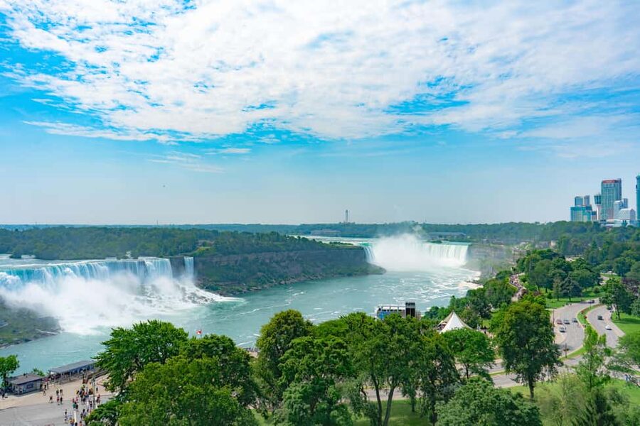 From Toronto: Niagara Falls Tour with Cruise & Maple Tasting - Lunch with a view above the falls