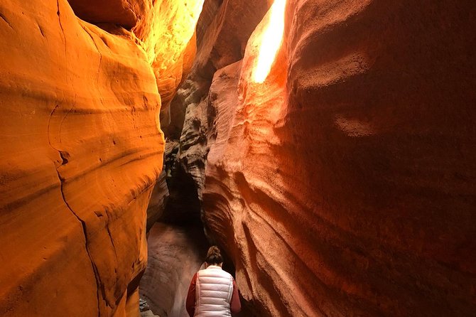 Guided Hike through Peek-a-Boo Slot Canyon (Small Group) - Walking through the narrow sandstone walls
