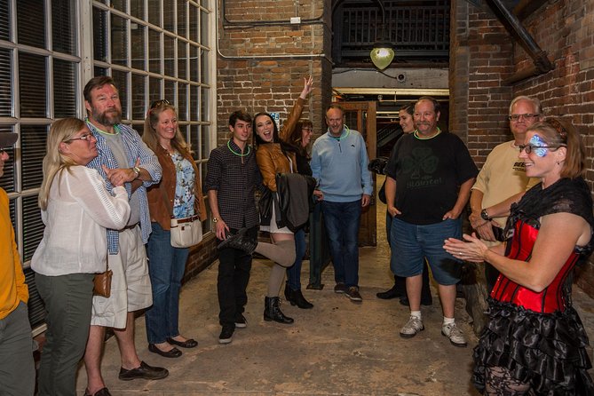 Haunted Seattle Booze and Boos Ghost Walking Tour - Pike Place after dark gives the tour its mood