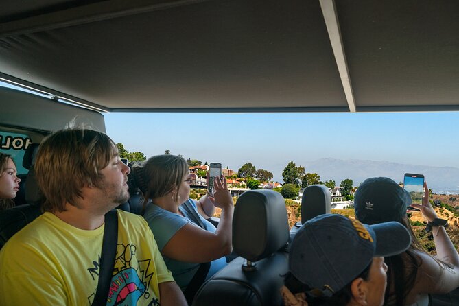 Hollywood, Beverly Hills & Celebrity Homes Tour by Open Air Bus - The Sunset Strip after dark and during the day