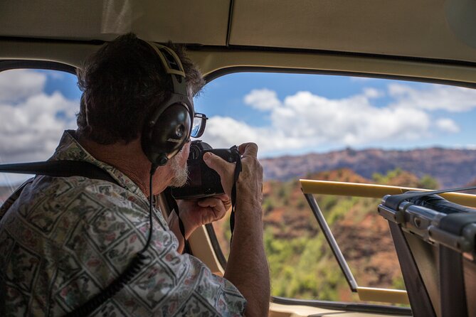 Kauai Deluxe Waterfall Safari: Helicopter Tour - Beaches, film scenery, and the volcano crater