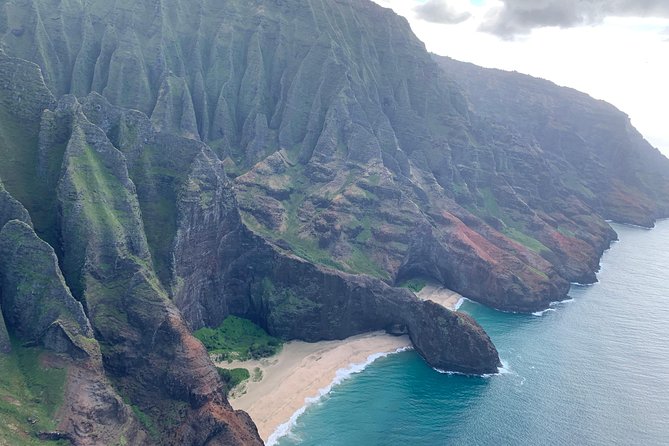 Kauai Private Doors-Off Helicopter: Ultimate Waterfalls & Canyons - Na Pali Coast and its cascading cliffs