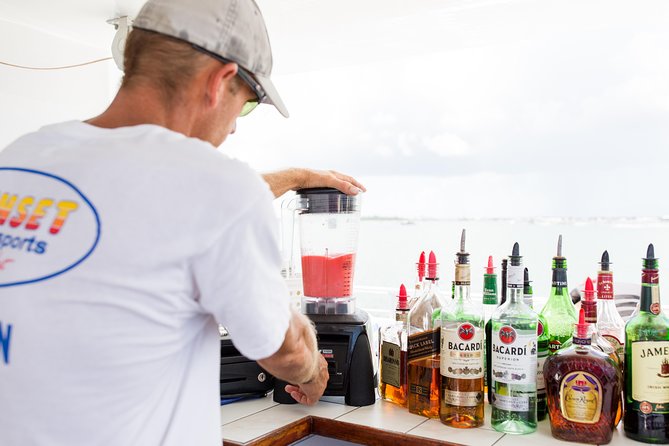 Key West Sunset Cruise: Dinner, Live Music & Drinks Included - Passing Mallory Square from the water