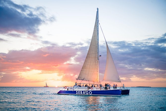 Key West Sunset Sail: Dolphin Watching, Wine, and Tapas - Passing Mallory Square, Fort Zachary Taylor, and Sunset Key