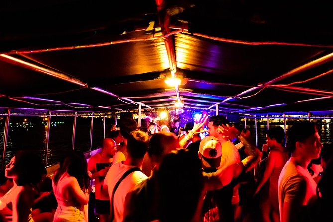 Miami Party Boat Cruise Music & Skyline Views - Boarding at Bayside after dark
