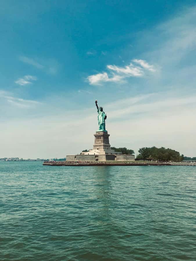 New York City: Statue of Liberty & Ellis Island Guided Tour - The ferry ride and the first view of Liberty Island