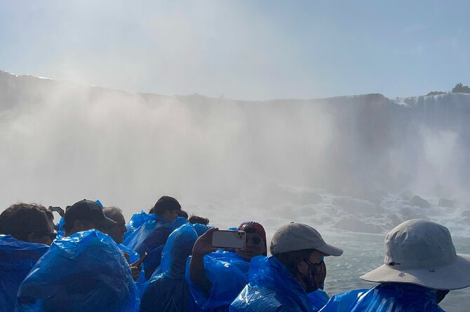 Niagara Falls Tour with Ticket for the Iconic Maid of the Mist - Getting ready for cold spray and wet shoes