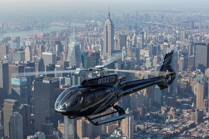 NY Helicopter Tour: New York City Skyline (Heliport fees Incl) - Lower Manhattan: the Statue of Liberty and One World Trade Center