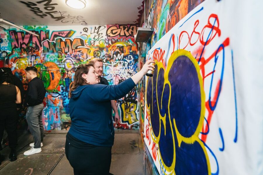 NYC: Brooklyn Graffiti Workshop with Local Artist - Creating a mural on the studio wall