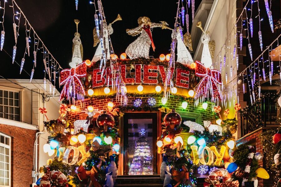 NYC: Dyker Heights Christmas Lights & Skyline View Bus Tour - Battery Park City at sunset