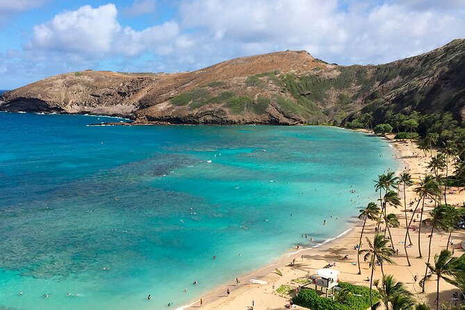 Oahu Grand Circle Island and Haleiwa Tour: 9-Hr Deluxe Experience - Nuʻuanu Pali and the story behind the view