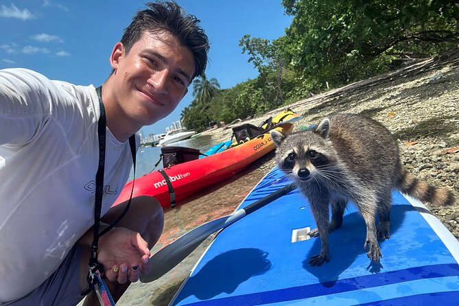 Raccoon Island: Exploration on SUP/Kayak - Finding the teal and white boat at Bill Bird Marina
