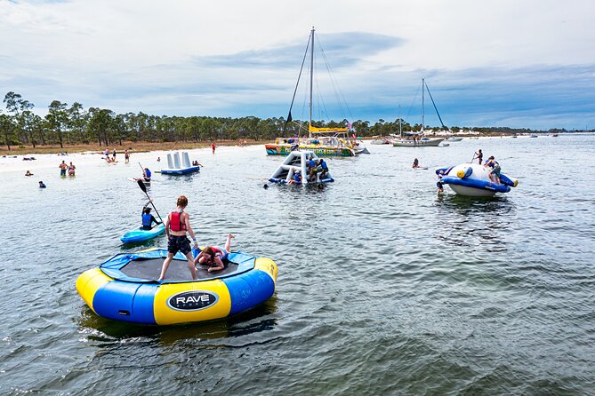 Shell Island Inflatable Adventure Park & Dolphin Sightseeing Tour - Weather, timing, and the large-group reality
