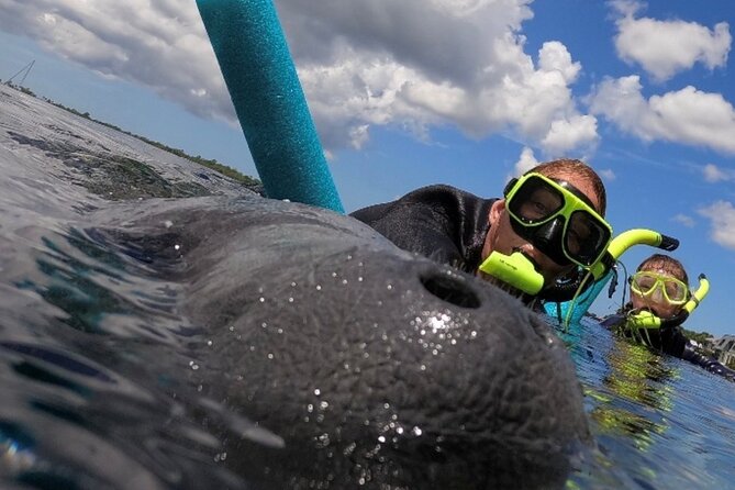 Small Group Manatee Snorkel Tour with In-Water Guide and Photographer - The short transfer to the heated pontoon