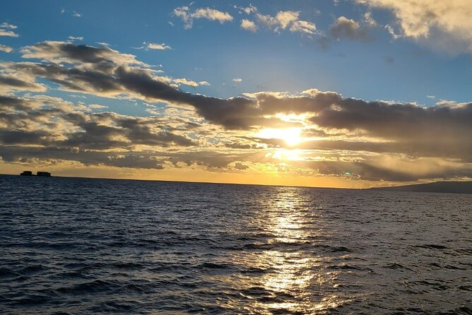 Sunset Dinner Cruise in Honolulu, Hawaii - Diamond Head Lighthouse at golden hour