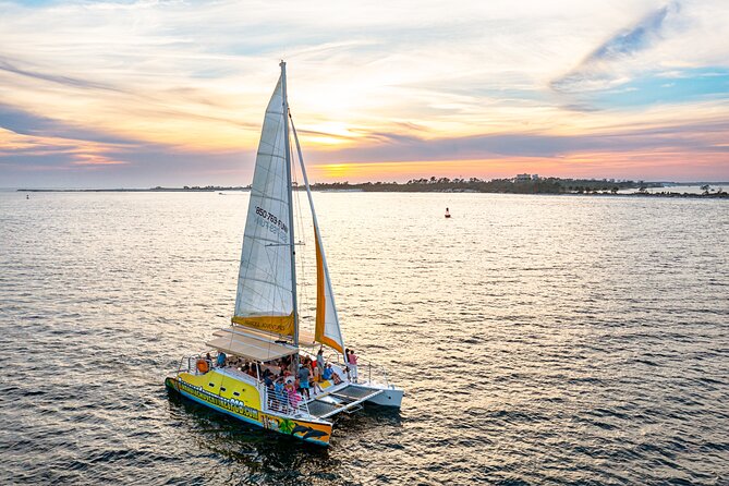 Sunset Dolphin Sail Aboard the Footloose Catamaran - Music, Drinks, And The Onboard Mood