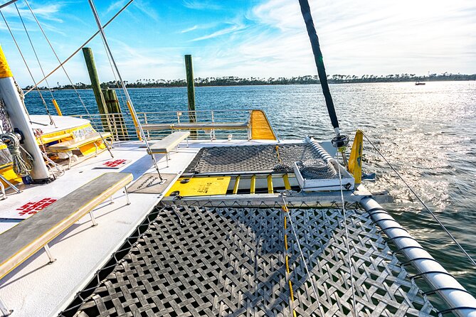 Sunset Dolphin Sail Aboard the Privateer Catamaran - Drinks, music, and the onboard bar