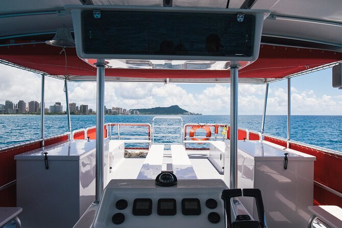 Waikiki Glass Bottom Boat Cruise - Watching reef fish through the glass
